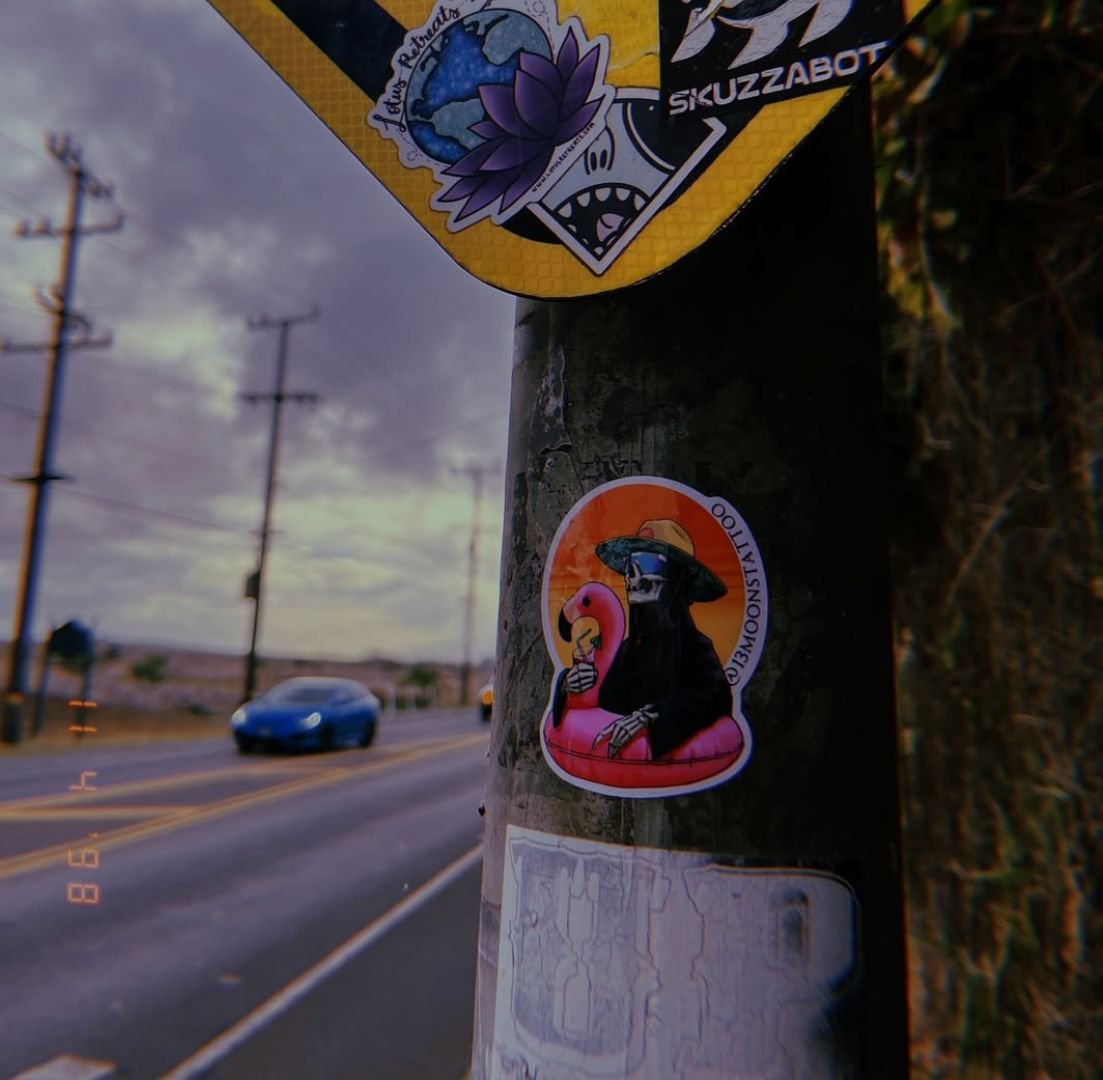 A man is positioned in front of a light source clicking pictures